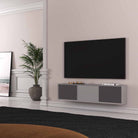 Lyngdorf CS-2 Speaker lifestyle shot front view of two units in cabinet below TV with cabinet door grilles closed