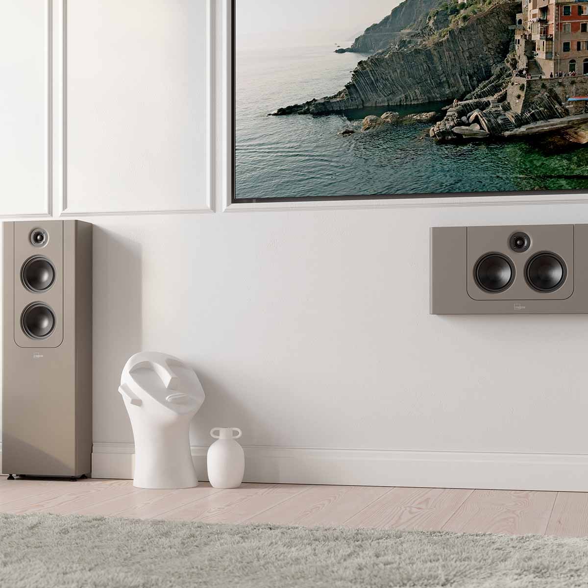 Lyngdorf LCR-2 On-Wall LCR Speaker - lifestyle photo brown speaker mounted below TV with brown Lyngdorf FR-2 to left