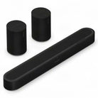 Sonos Beam Ultra Soundbar - black - front and top view angled right with two Sonos Era 100 behind bar