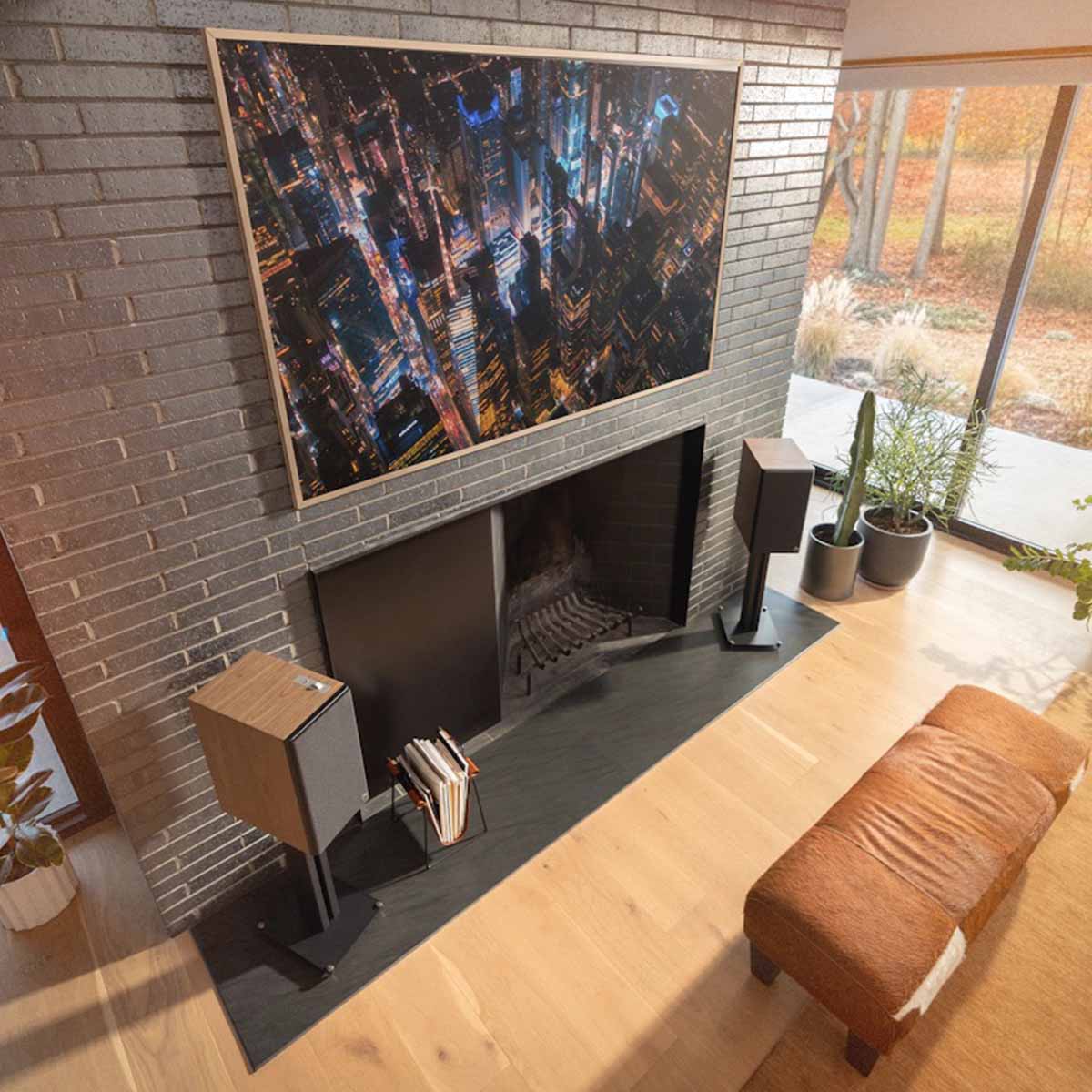 Klipsch The Nines II Dolby Atmos 8" Powered Speakers - Pair - lifestyle photo pair of Walnut speakers on stands on either side of a fireplace in a living room