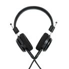 Black over-ear wired headphones with padded ear cups, a padded headband, and visible silver metal connector tips on a plain white background.