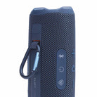 JBL Flip 7 Waterproof Bluetooth Speaker - Blue - vertical detail with carabiner attached
