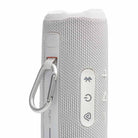 JBL Flip 7 Waterproof Bluetooth Speaker - White - vertical detail with carabiner attached