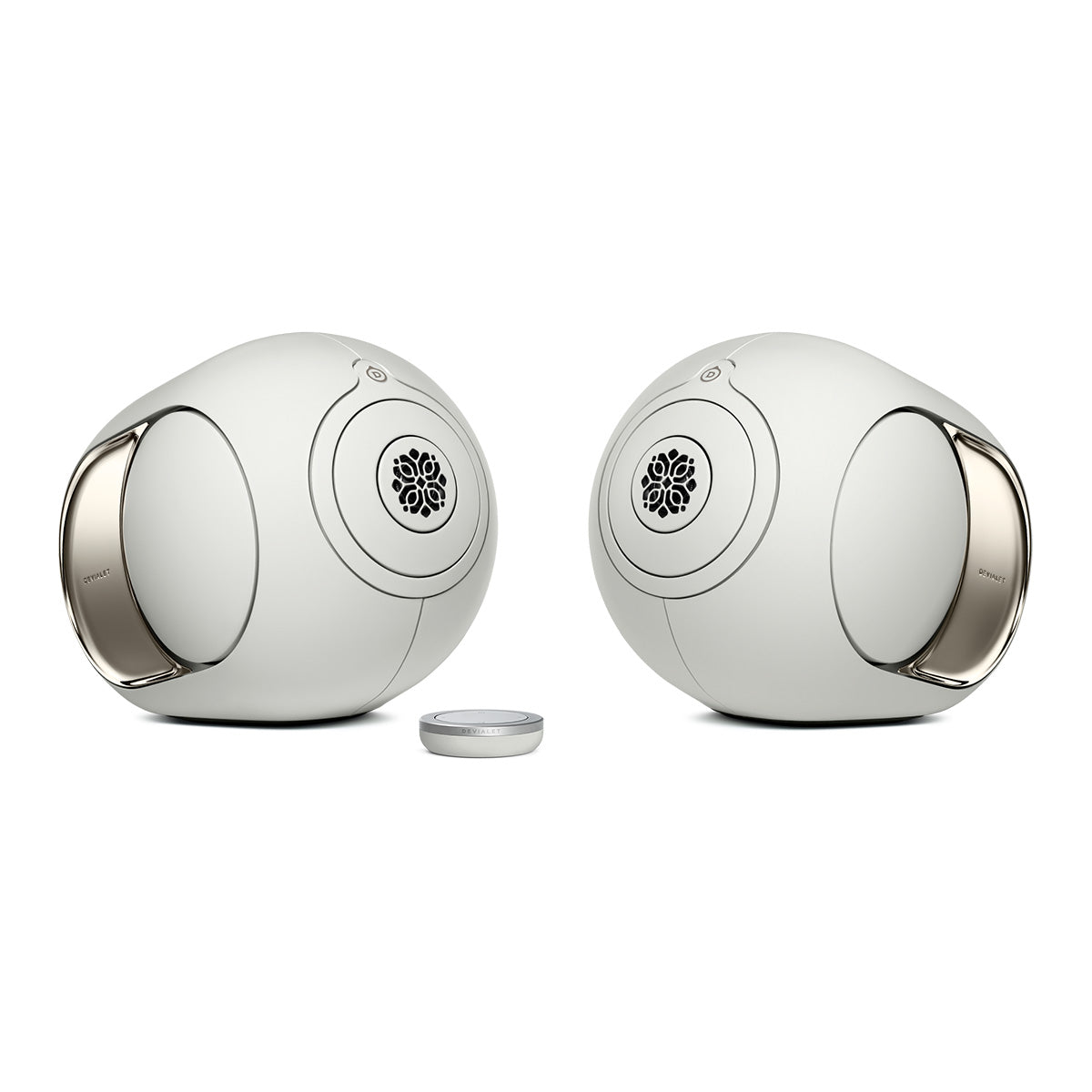 Devialet Phantom Ultimate 108 dB High-End Connected Speaker - Light Pearl - two speakers facing inward with remote center left