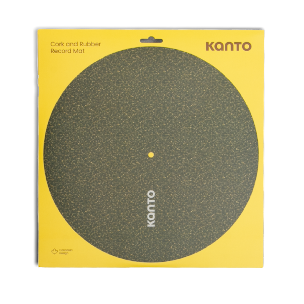 Kanto cork and rubber record mat in its original yellow packaging, featuring a circular textured dark green-brown mat with the Kanto brand name printed on it.