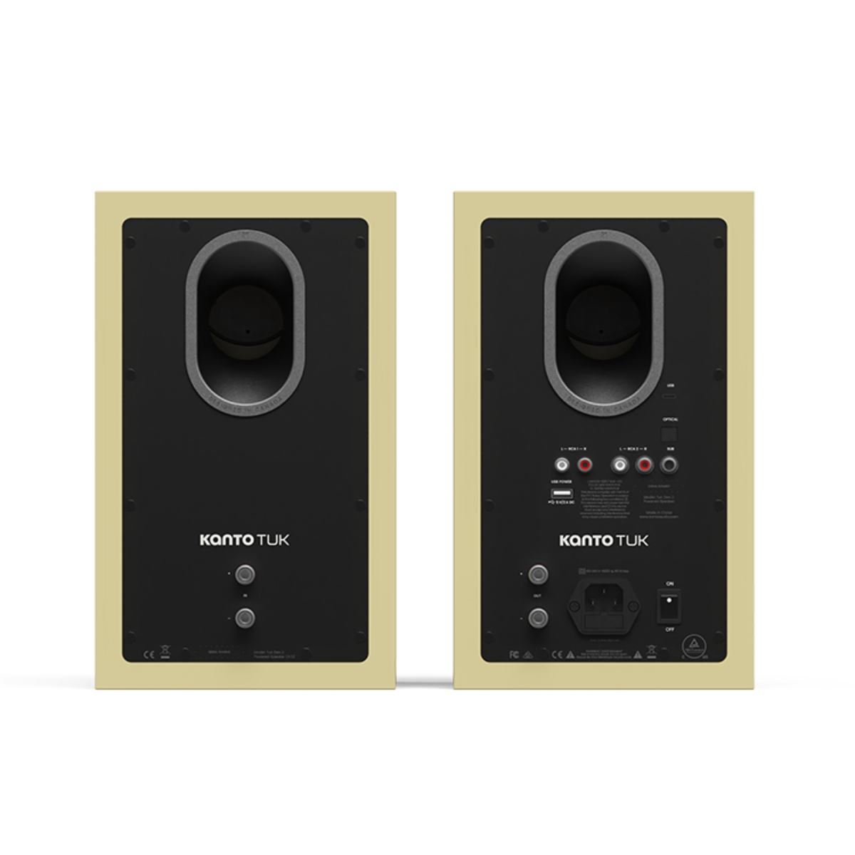 Front and back views of a pair of Kanto TUK bookshelf speakers in a light beige finish with black front panels, shown on a white background.