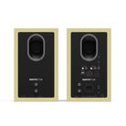 Front and back views of a pair of Kanto TUK bookshelf speakers in a light beige finish with black front panels, shown on a white background.