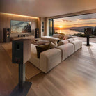 Lifestyle photo of Klipsch Reference Premiere Series III in walnut in a living room