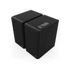 Klipsch The Fives II Dolby Atmos 5.25" Powered Speakers - Pair - Ebony front top and side view angled left with grille