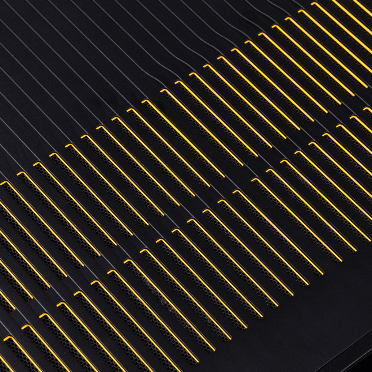 Close-up of a Arcam Radia AVA15 9-channel Class D Home Theater Receiver with repeating diagonal gold metallic contacts.