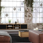 Lyngdorf TDAI-1120 Compact Streaming Amplifier with RoomPerfect lifestyle shot of unit on shelf