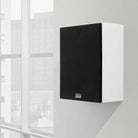 Lyngdorf MH-2 Satellite Speaker lifestyle shot white speaker with black grille mounted on wall