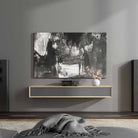 Lyngdorf TDAI-2210 Streaming Integrated Amplifier with RoomPerfect lifestyle shot of unit on shelf below painting