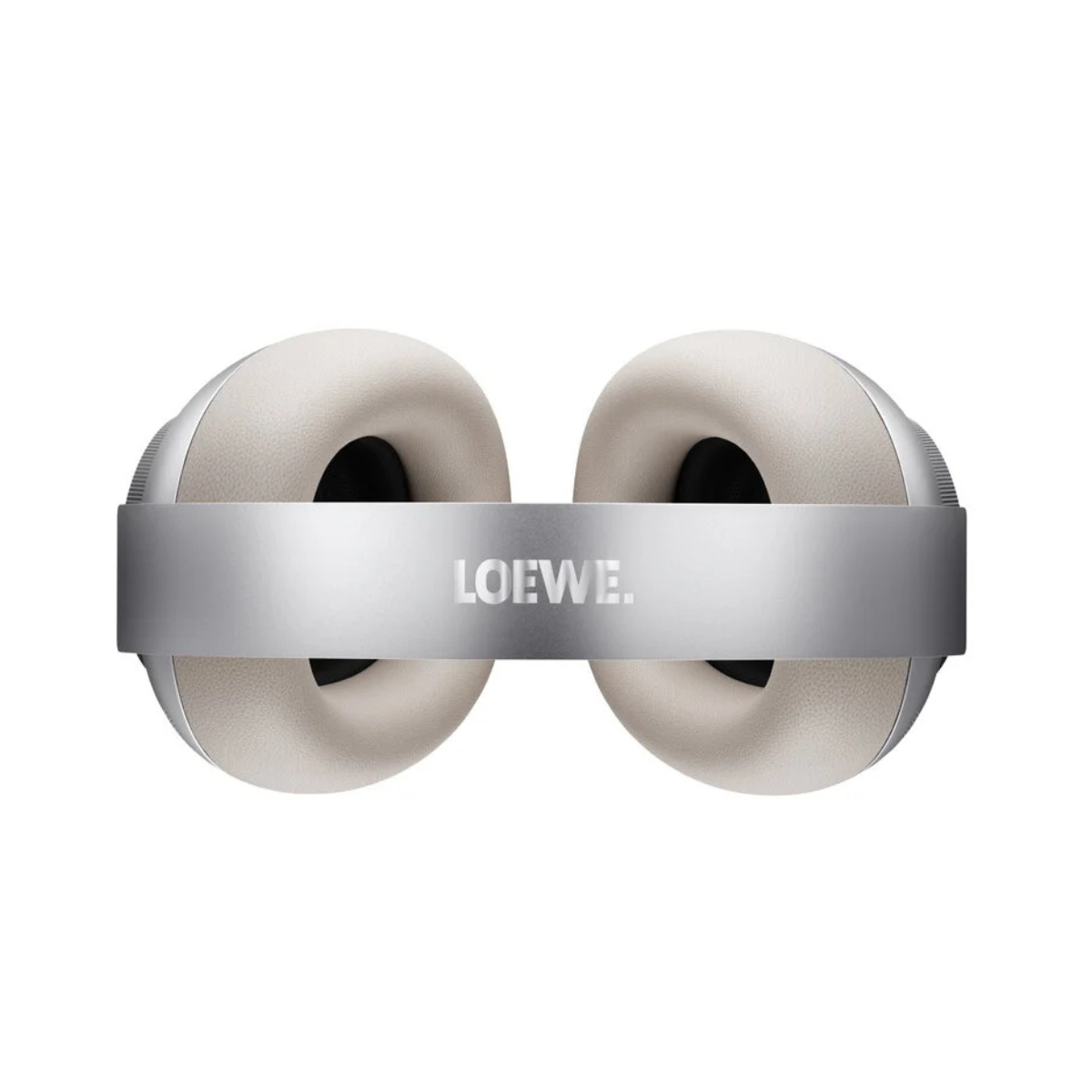 A pair of white over-ear headphones with a metallic silver headband featuring the LOEWE. logo, shown against a plain white background.