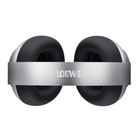 A pair of over-ear Leowe Leo headphones with large black cushioned ear pads and a metallic silver headband featuring the LOEWE logo, shown against a plain white background.