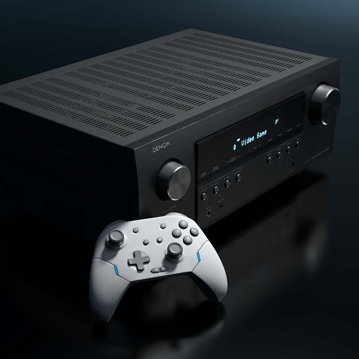 Denon AVR-S980H AV Receiver front view angled right on dark background with video game controller in front of unit