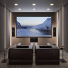 Lyngdorf D-500 Center Speaker lifestyle shot of unit below theater screen