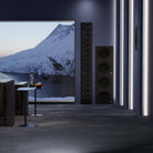 Lyngdorf LS-1000 Line Source Speaker lifestyle shot of unit in wall to right of theater screen