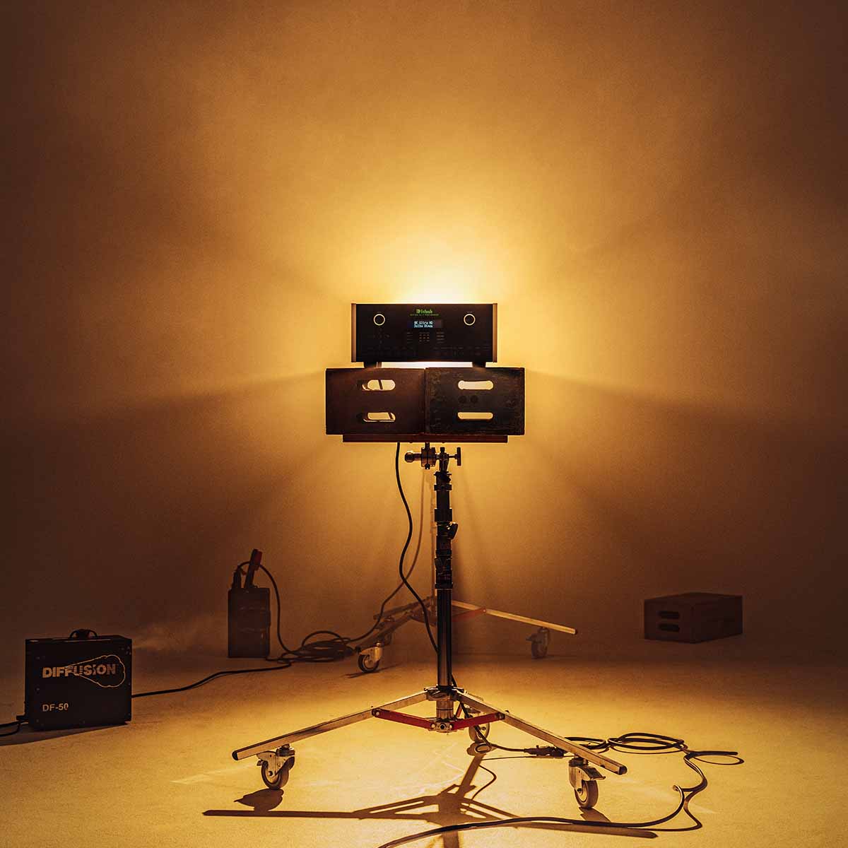 McIntosh MX124 A/V Processor editorial photo of unit backlit on stand