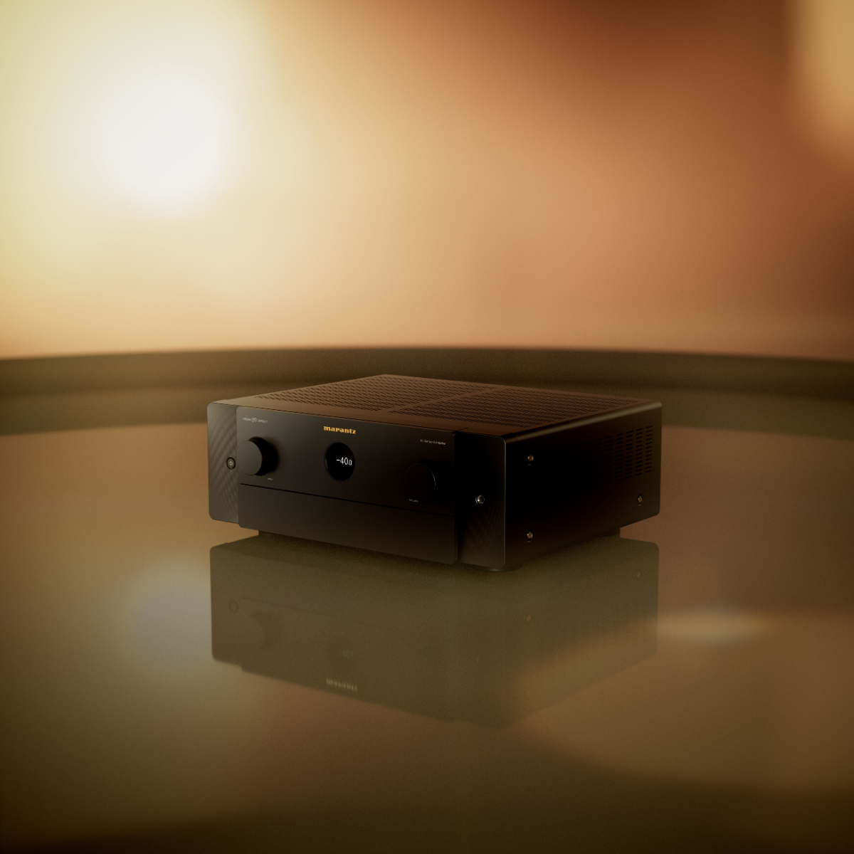 A black Marantz Cinema 50 Series 2 AV Receiver sitting on a reflective surface against a warm, glowing brown background.