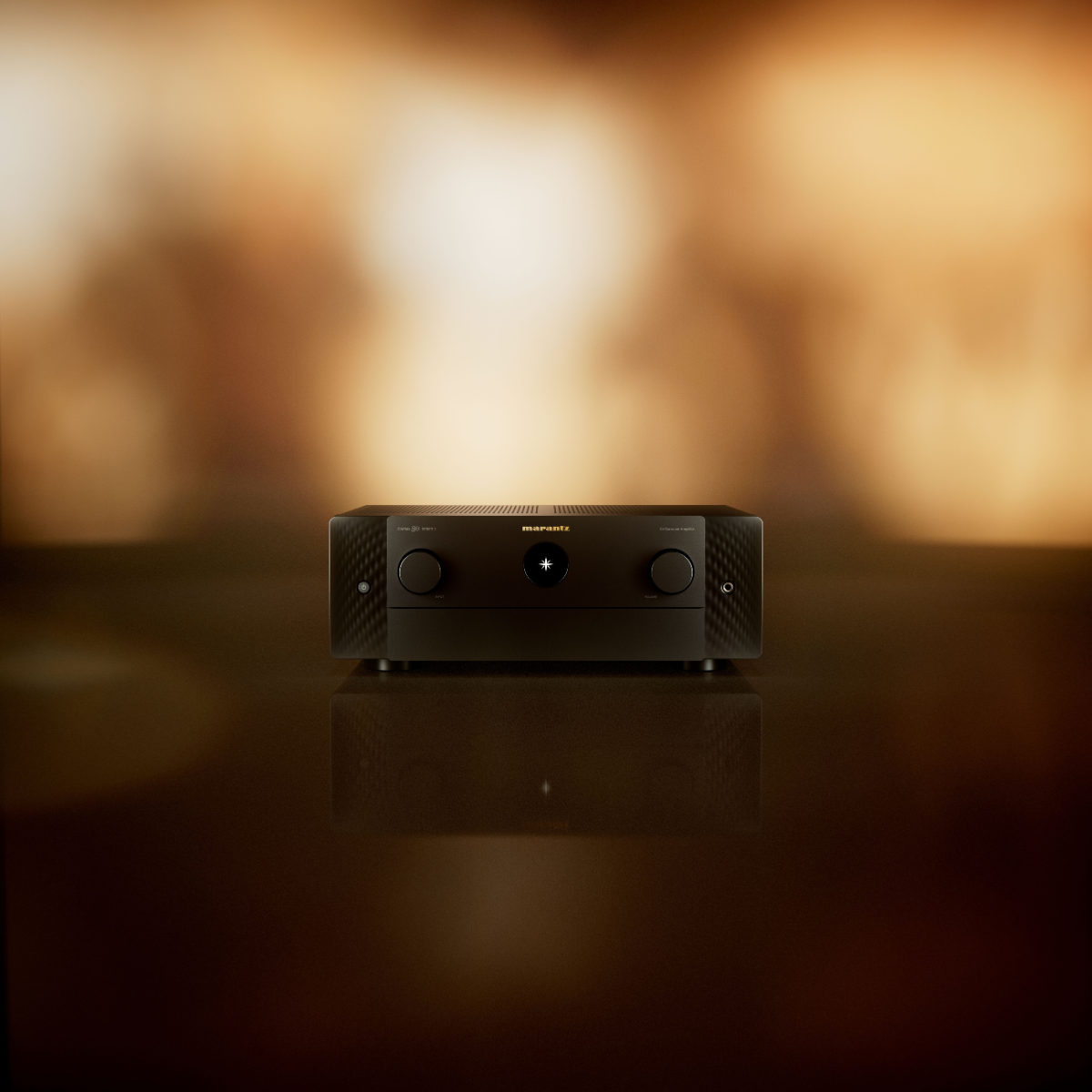 A black Marantz Cinema 50 Series 2 AV Receiver centered on a dark reflective surface, with a warm golden bokeh background.