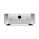 A silver Marantz amplifier receiver with two large white control knobs and a central black display screen, set against a plain white background.