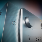 Close-up of a silver and gold Marantz Cinema 60 Series 2 AV Receiver with a large rotary knob, power button, and control labels on a dark background.