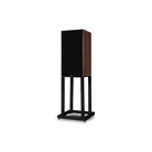 A Mission 700 Bookshelf Speaker on a black metal stand, featuring a dark brown wood-grain side panel and a black front grille, set against a plain white background.