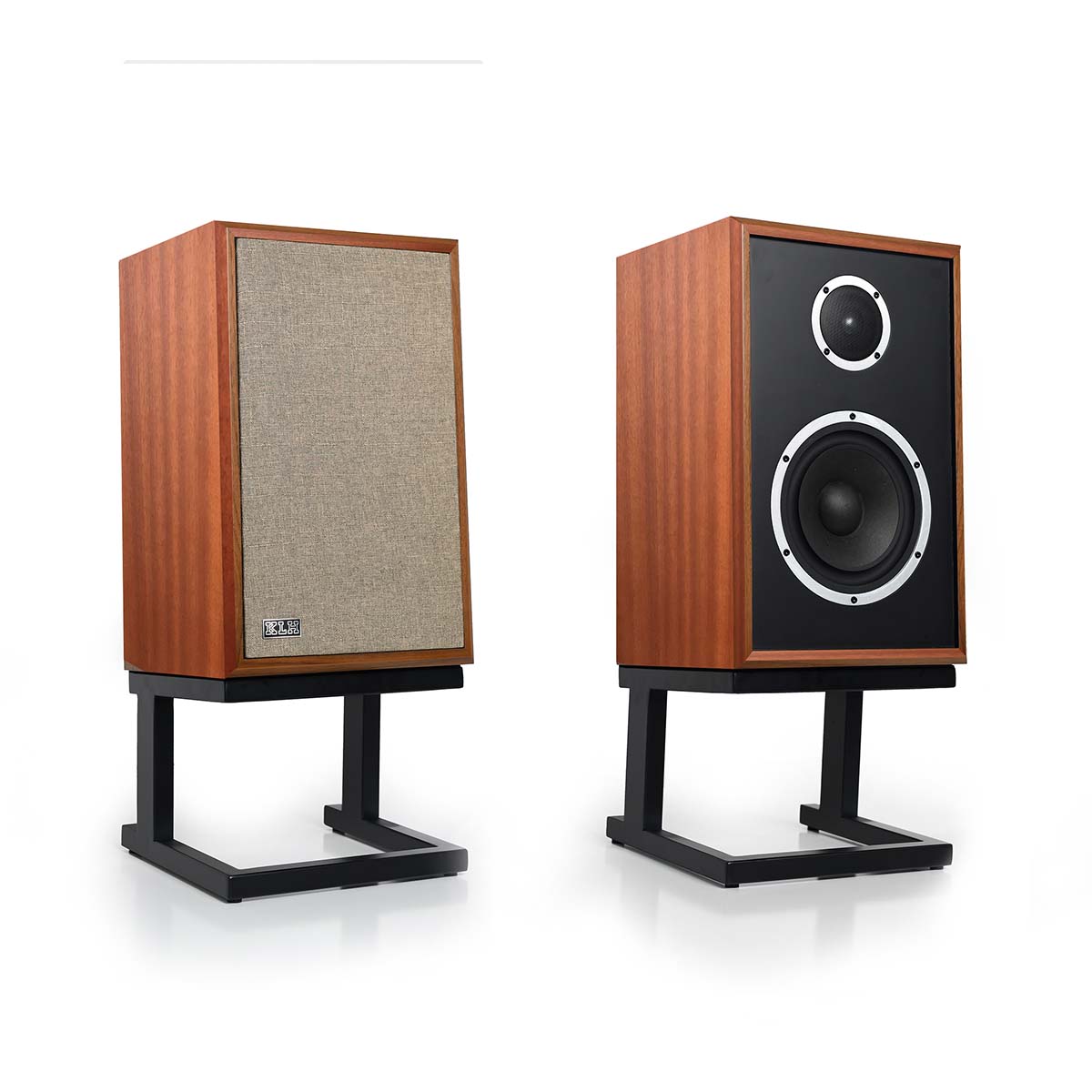KLH Model Three Acoustic Suspension Loudspeakers - pair of mahogany speakers both angled right, left speaker with grille, right speaker without grille
