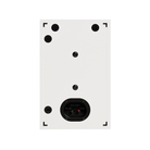 White rectangular mounting Monitor Audio Bronze On-Wall 7G Slim, Two-way On-Wall Speaker with pre-drilled screw holes, corner brackets, and a circular black electrical outlet cover at the bottom, shown on a plain white background.