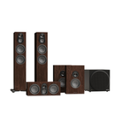 A Monitor Audio Silver 8G Speakers surround sound system with four wood-finish speakers and a black subwoofer, shown against a solid white background.