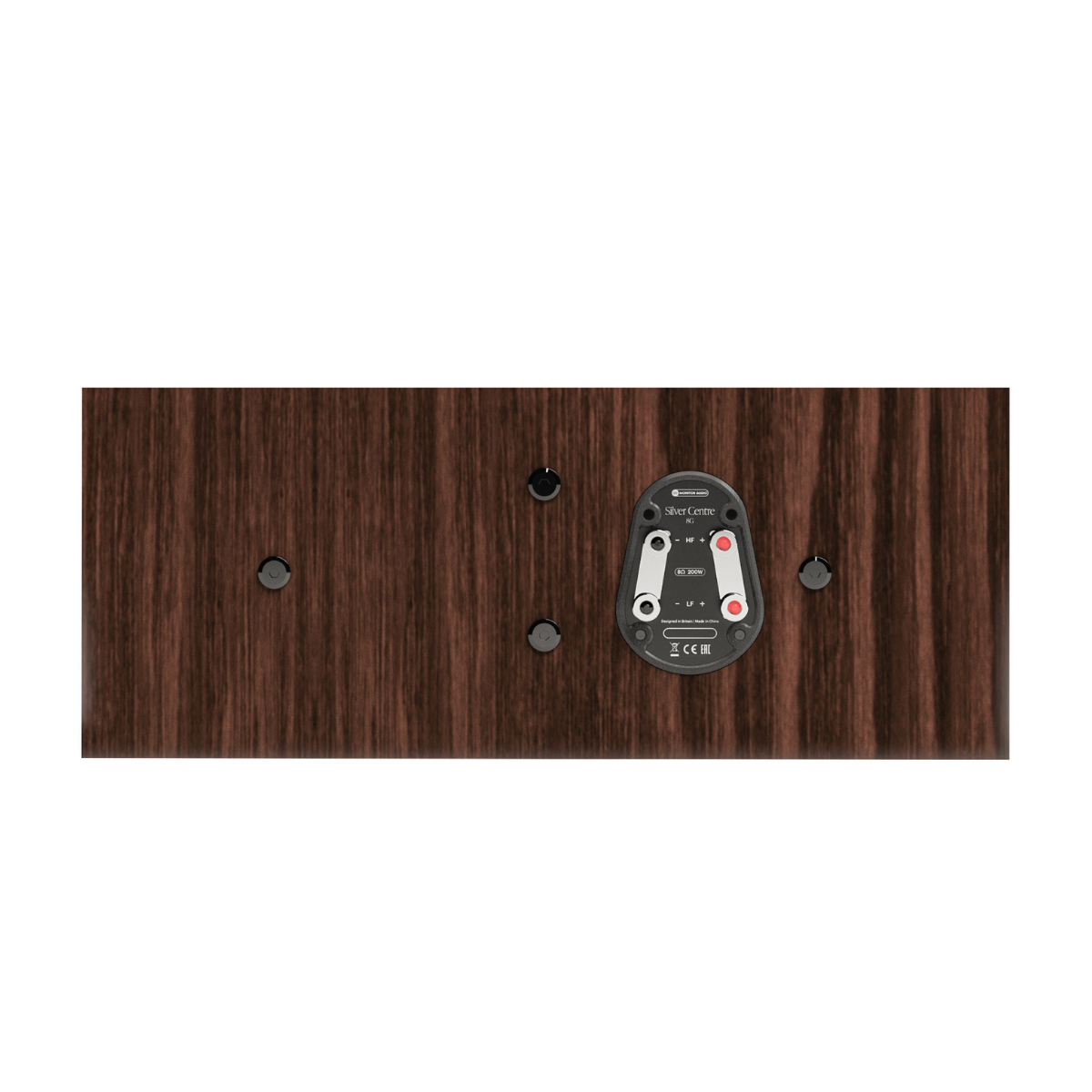 A close-up of a dark brown wood-grain panel featuring a black audio input jack, four screw holes, and a central 3-pin audio adapter plug.