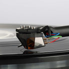Rega ND9 Moving Magnet Phono Cartridge - side view of cartridge mounted on tone arm with needle on record