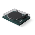 Green turntable with clear dust cover on a white background
