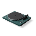 Green turntable with black platter on a white background