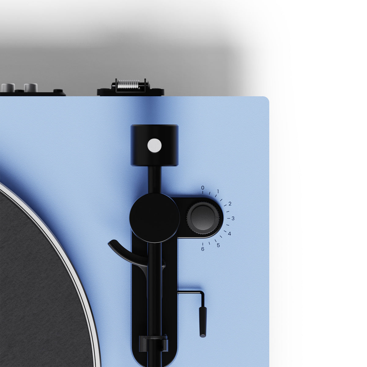 Close-up of a turntable with a blue base and black control panel.