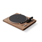 Wooden turntable with black platter on a white background
