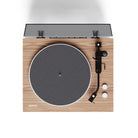 Wooden turntable with a gray platter on a white background