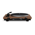Turntable with wooden plinth on a white background