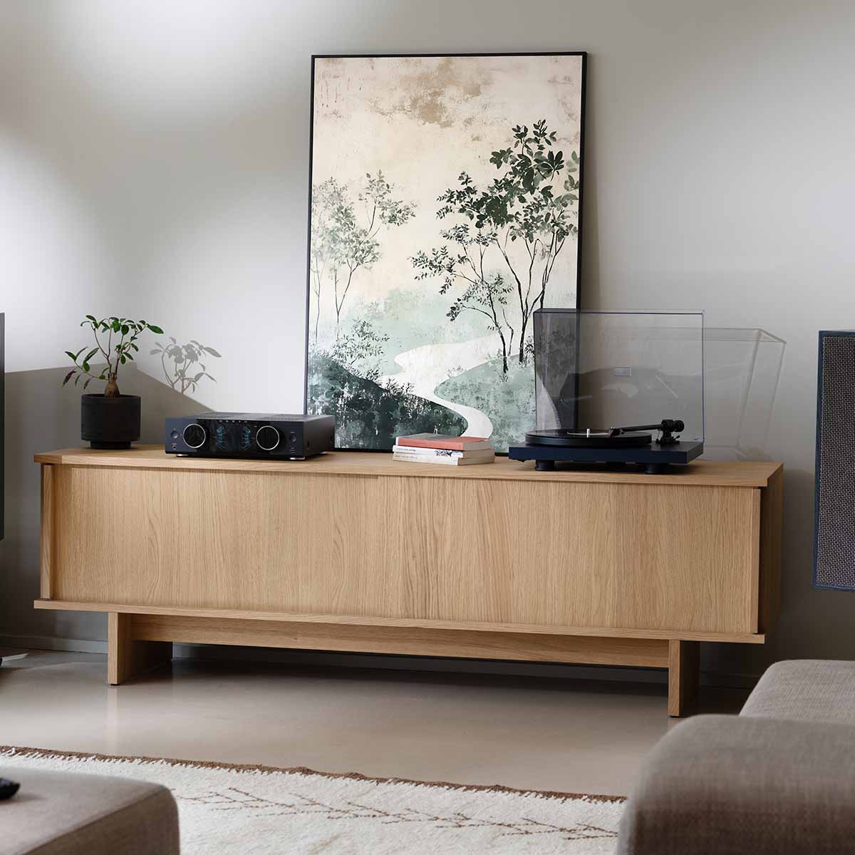 Onkyo Muse Y-40 Network Integrated Amplifier - Black - lifestyle photo of unit on cabinet to left of turntable