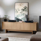 Onkyo Muse Y-40 Network Integrated Amplifier - Black - lifestyle photo of unit on cabinet to left of turntable