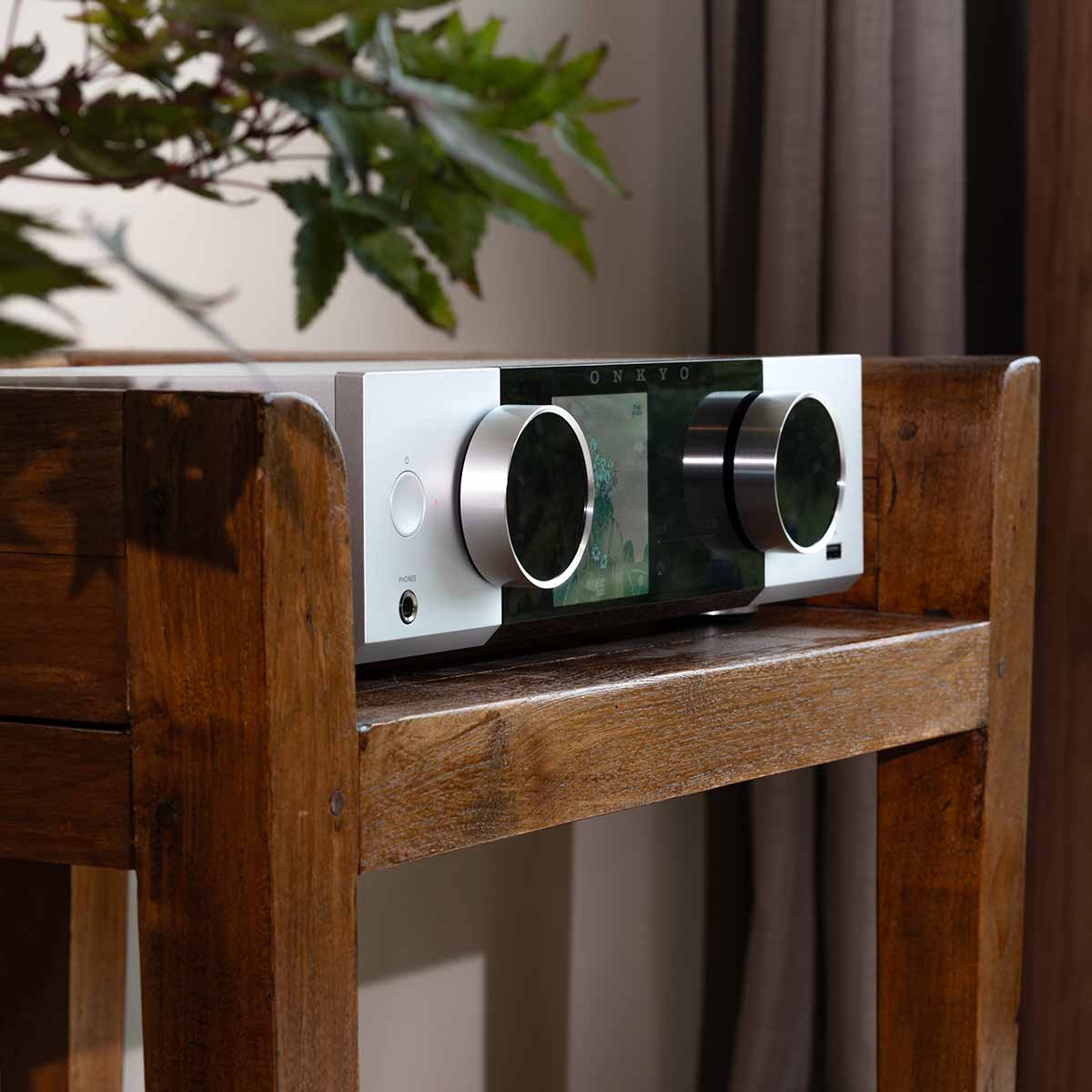 Onkyo Muse Y-40 Network Integrated Amplifier - Silver - lifestyle photo of unit on cabinet facing right