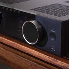 Onkyo Muse Y-50 Network Integrated Amplifier - Black - lifestyle view of unit on cabinet facing left closeup of left knob