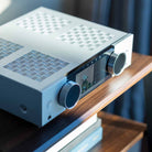 Onkyo Muse Y-50 Network Integrated Amplifier - Silver - lifestyle view of unit on shelf top down facing left