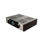 A high-end audio receiver or amplifier with a brushed silver top panel, black side panels, a central black control face with a digital display, and a large central rotary knob, shown on a plain white background.