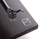 Rega Planar 1 Turntable - black - top down view of Planar 1 logo and Carbon cartridge at end of tone arm
