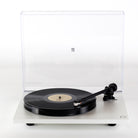 Rega Planar 1 Turntable - white - front view view with open dust cover, record on platter and tone arm engaged