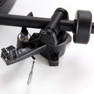 Rega Planar 1 Turntable - white - detail of RB110 tone arm counterweight end