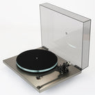 Rega Planar 6 RS Special Edition Turntable - high-angle three-quarter view with open dustcover and record mat