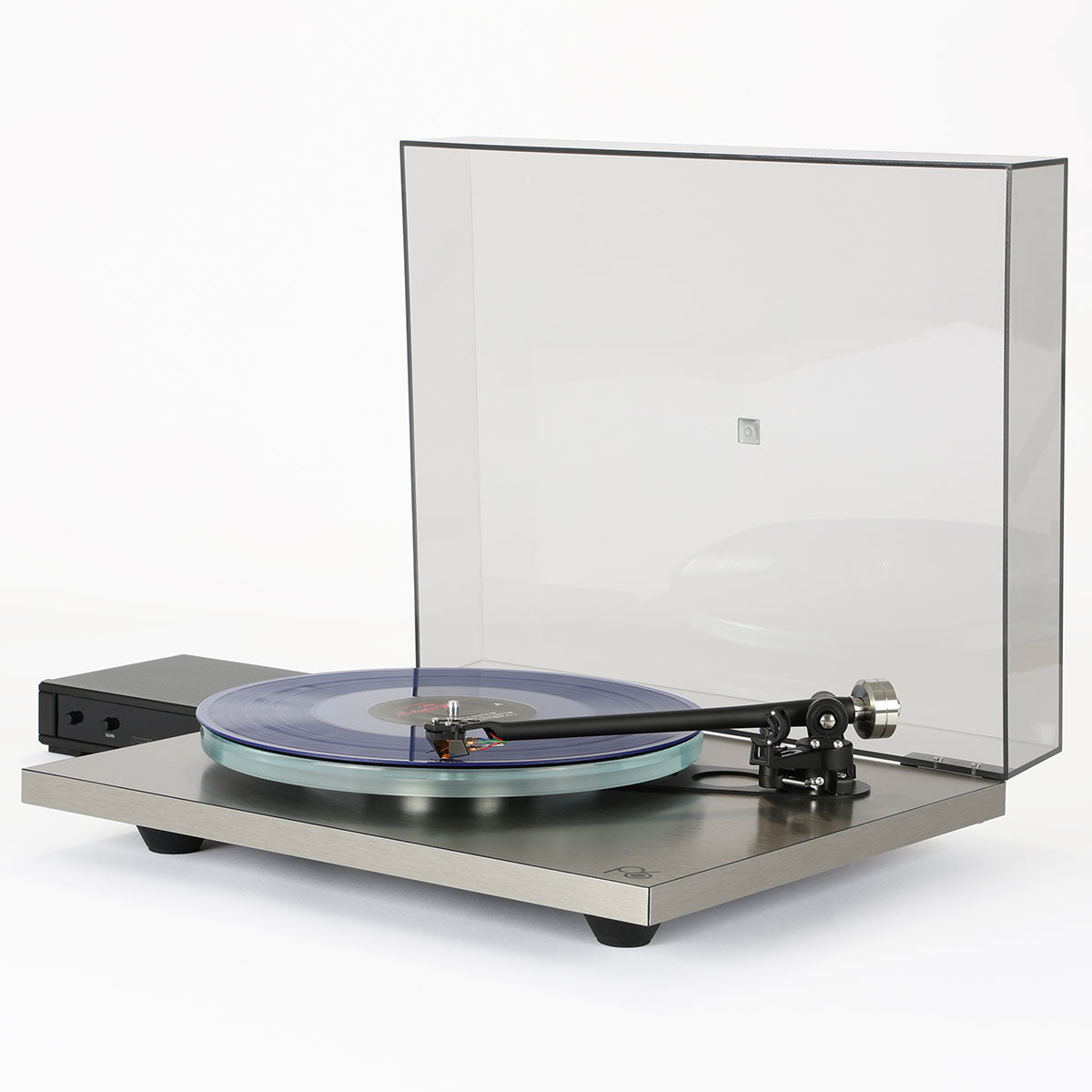 Rega Planar 6 RS Special Edition Turntable - front view with open dustcover and record on platter with tonearm engaged, separate phono stage to left, both units angled left